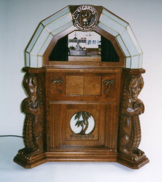 Solid Cherry Jukebox with carved aligators and leaded glass for RJ Gators Restaurant