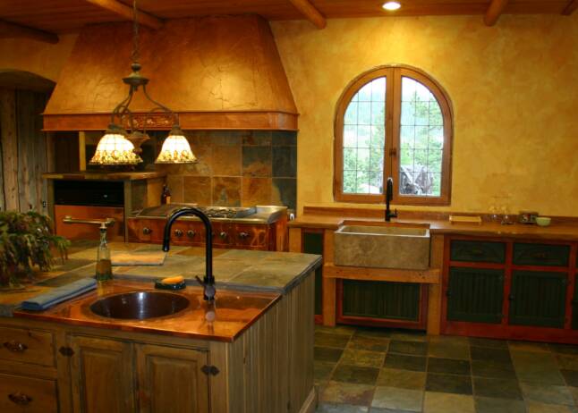 Knotty pine distressed cabinets, stained and color washed, 2 sinks.