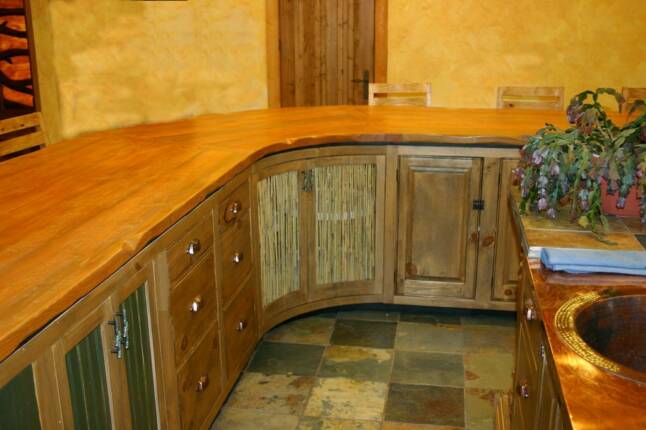 Variety of door and drawer finishes including bamboo inserts.