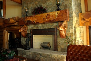 Carved mantle big horn sheep, elk, mountain lion