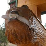 Bear carved into beam end
