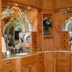 Carved master bath cabinets in Breckenridge Colorado mountain style.