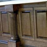 Wood columns and oak raised panel bar front