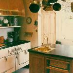 Oak cabinets including custom basket drawers