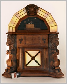 Jukebox with carved lions, state of the art electronics